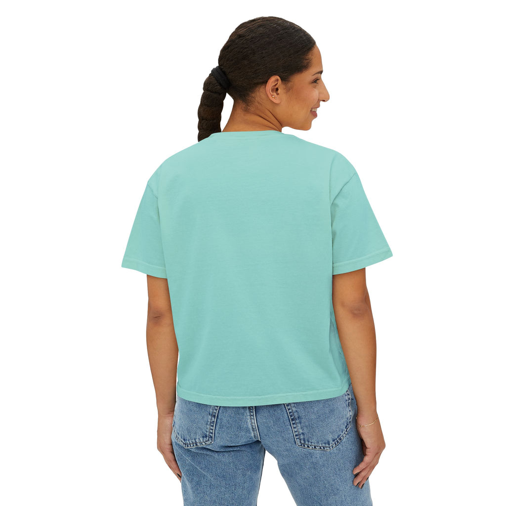 Mint green oversized t-shirt paired with blue jeans, showcasing streetwear style.