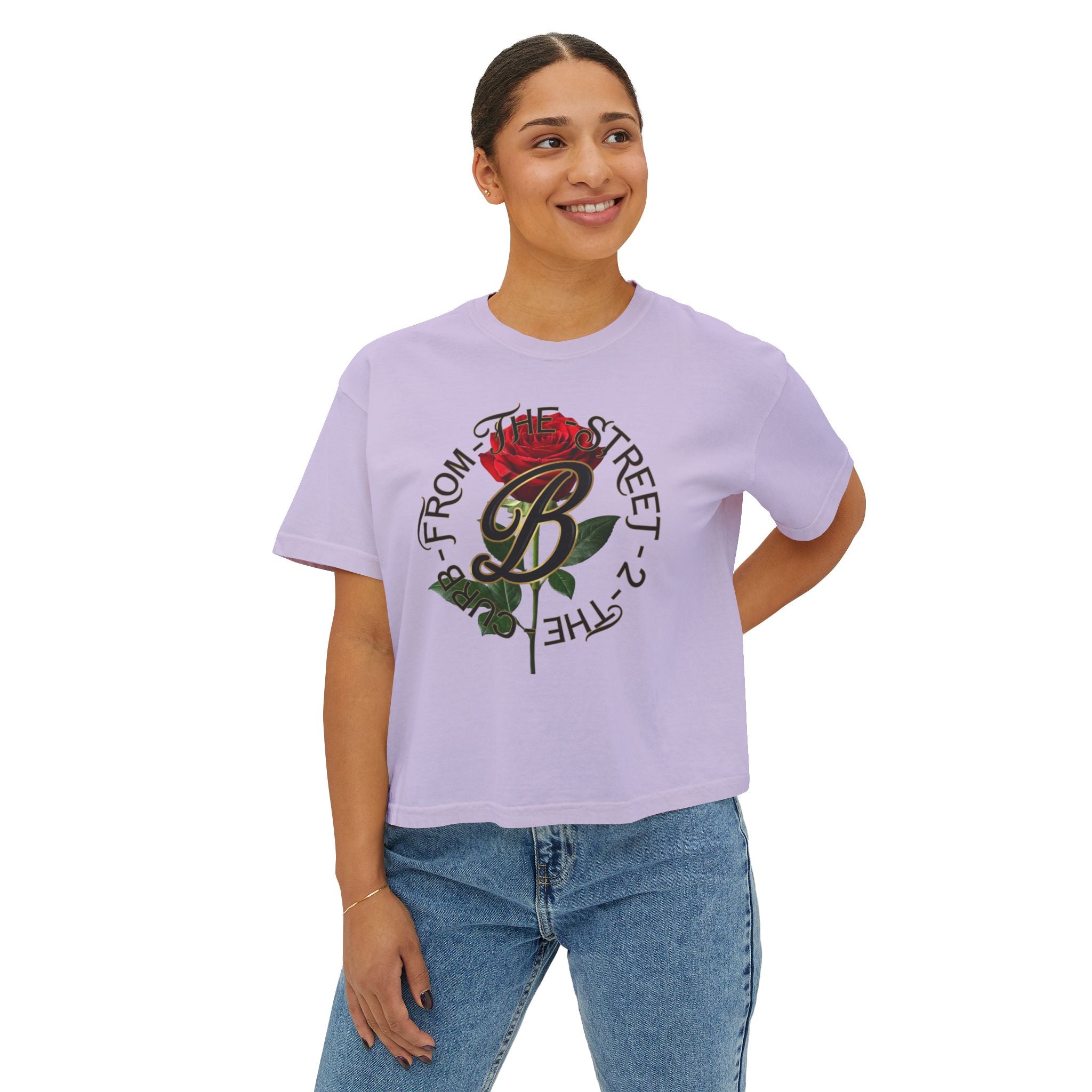 Lavender streetwear tee with red rose graphic and 'From The Street 2 The Curb' text, paired with jeans