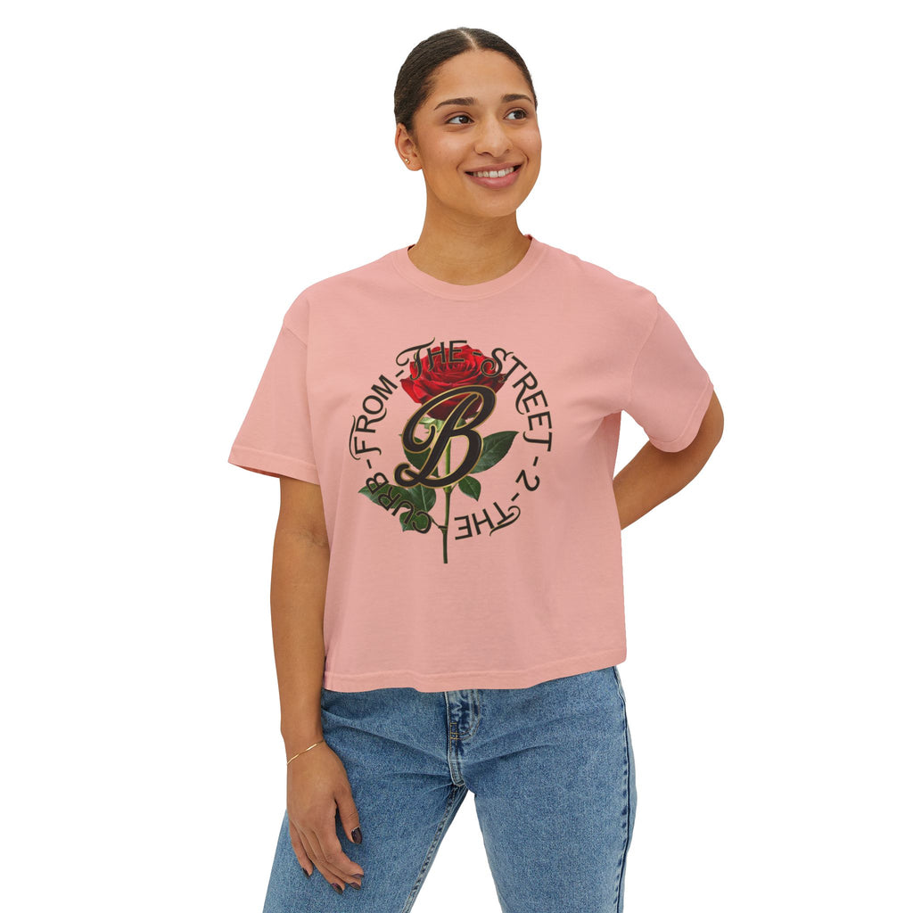 Pink streetwear tee with rose graphic and 'From The Street 2 The Curb' text, styled with jeans